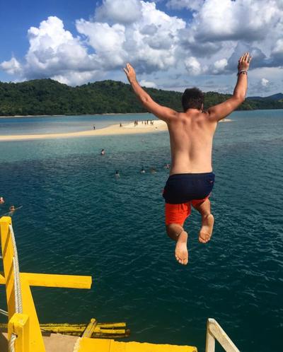 Jumping off the booze-cruise boat in El Nido, Palawan.